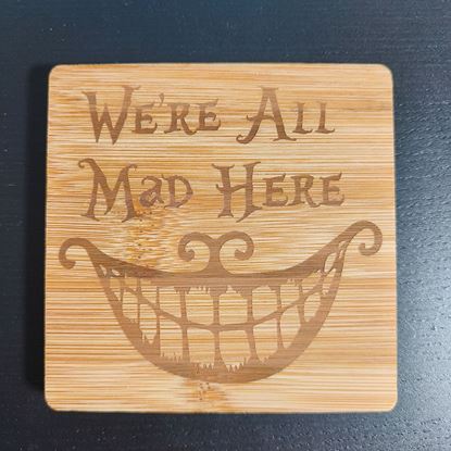 Afbeeldingen van We're All Mad Here onderzetter/snijplank